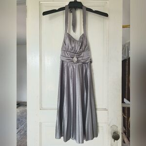 Small size metallic dress from Speechless.  Shiny with a gemstone broach.